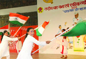 Schoolchildren perform a dance drama on the occasion of the 122nd birth anniversary of Chacha Nehru at Bal Bhawan in New Delhi on Monday.