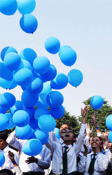 Schoolchildren participate in a diabetes awareness campaign on World Diabetes Day in Gurgaon on Monday