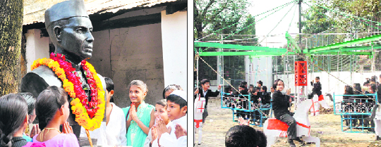 Students pay tributes to Jawaharlal Nehru in the Nehru ward of the old prison where he was jailed by the British in Dehradun on Monday; and (right) 