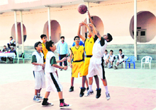 A match under way in the Inter-council School Junior Boys Basketball Tournament played in Dehradun on Monday. 