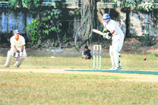A batsman in action in a match in the North Zone Inter-university Cricket Tournament played in Dehradun on Monday. 