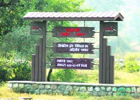 A newly painted signboard at Rajaji National Park