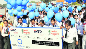 Schoolchildren participate in an awareness rally on World Diabetes Day in Gurgaon on Monday. 