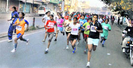 Girls participate in Aao Bhajen Saare marathon organised by the Chaupal in Sonepat.