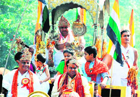 Devotees participate in the Rath Yatra on the occasion of the annual function of Jain Mandir at Sector 15 in Gurgaon.