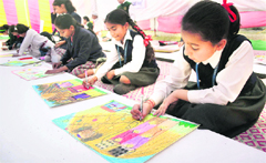 Students participate in a state-level painting competition on energy conservation-2011 organised by NHPC Ltd in University of Jammu on Monday.