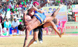 USA and Sri Lanka (R) players in action at Hoshiarpur on Monday.