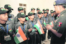 Maj-Gen GP Singh, head of Army Service Corps, Western Command, interacts with students from Jammu and Kashmir at Chandi Mandir in Panchkula on Tuesday