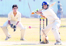 A player plays a shot during the ongoing Inter-School Cricket Tournament being played at DAV school Sector 8, Chandigarh on Tuesday.