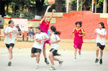 Players in action in a match in the DDCSA Junior Girls Basketball Tournament played at Welham Girls School in Dehradun on Tuesday. 