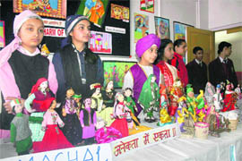 Students display their work during a craft exhibition at Dayanand Public School in Shimla