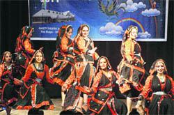 Girls perform at a cultural function organised by the Charu Castle Foundation at the Gaiety Theatre in Shimla