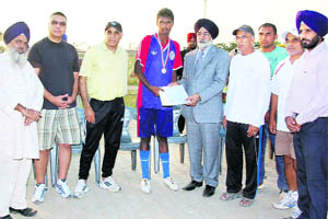 Amit Kumar (fourth from left)  receives a certificate in Jagraon. 
