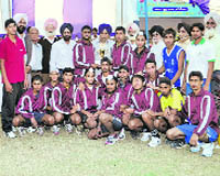 Winners pose with their trophy in Doraha. 