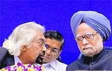 PM Manmohan Singh with his Adviser on Public Information, Infrastructure and Innovations, Sam Pitroda, during the release of the first report of National Innovation Council at a function at Vigyan Bhawan in New Delhi on Tuesday