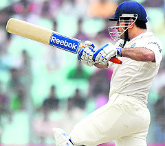 MS Dhoni plays a shot against West Indies in Kolkata on Tuesday. Dhoni scored 144.