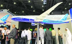 A model of a Boeing airplane is displayed at the Dubai Air Show on Wednesday. Airbus outpaced US rival Boeing in promoting the new versions of their single-aisle eco-friendly jets, but both walked away from the show with deals of around 