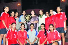 The Welham Girls Junior Basketball team with the DDCSA Junior Girls Bball Tournament trophy in Dehradun