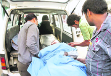 A person injured in the road accident near Gurgaon on Wednesday being taken to a hospital.