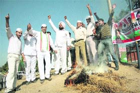 Members of the District Congress Seva Dal Jammu (Urban) protest against the arrival of the Jan Chetna Yatra in Jammu on Wednesday