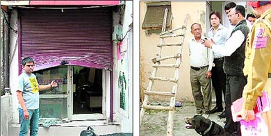 The broken shutter of a boutique from where the thieves took away ready-made garments; and (right) a dog squad tries to trace the clues of thieves who broke into a showroom of computers in Jalandhar on Tuesday night