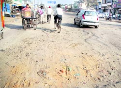 Potholed Kapurthala Road makes driving difficult for commuters in Jalandhar