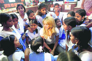 Latin pop star and UNICEF goodwill ambassador Shakira interacts with a group of girls at Kasturba Gandhi Balika Vidyalaya in Udaipur on Tuesday. 