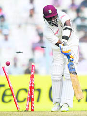 West Indies Darren Bravo is clean bowled during the third day of the second Test against India at The Eden Gardens in Kolkata on Wednesday. 