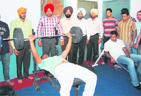 Inmates exercise at the Central Jail gym in Amritsar on Thursday