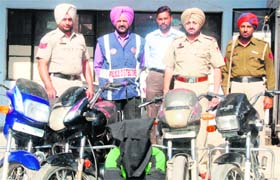 The accused, Heera Singh with stolen motorcycles in Amritsar on Thursday
