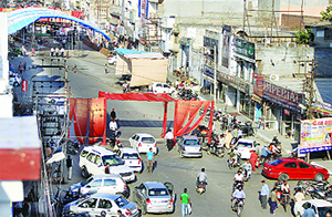 Organisers of a religious function erect tents on the Nakodar road near Jyoti Chowk leaving the entire road blocked