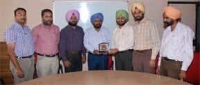 Staff members of the Government Polytechnic College honour Kamaldeep Singh, director, Telecom, New Delhi