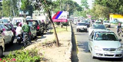 Commuters caught in a traffic jam near Command Hospital as Jan Chetna Yatra passes through Panchkula on Thursday