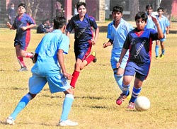 Players in action during a football match in Chandigarh on Thursday