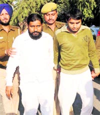 The two accused, Akram Khan and Kavinder Singh, at the District Courts in Chandigarh on Thursday