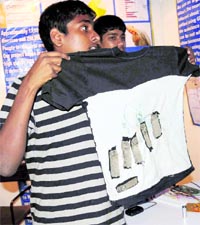 Students with their innovative heart-attack alert vest at the IRIS event in PEC, Chandigarh, on Thursday