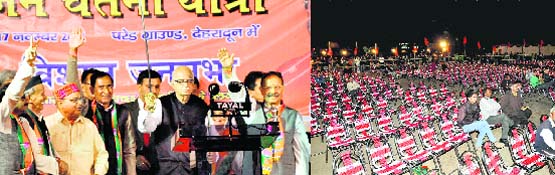 LK Advani displays a sword presented by CM BC Khanduri at a rally in Dehradun on Thursday; and (right) empty chairs at the rally