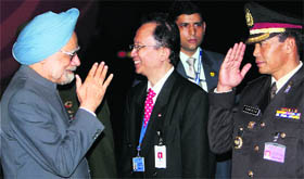 PM Manmohan Singh being welcomed on his arrival in Bali, Indonesia, on Thursday. 