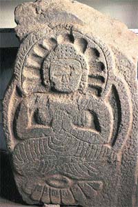An ancient rock carving of Lord Buddha excavated in the Suru Kartse valley in Kargil district