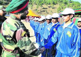 Maj Gen GS Shergill, GOC, Counter Insurgency Force Romeo, interacts with schoolchildren from Rajouri before they proceeded on an educational tour on Thursday