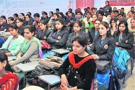 Students participate in an inter-college debate organised by the Centre for Women Studies of MIER College of Education in Jammu on Thursday