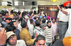 Youths gather around the stage during the function.