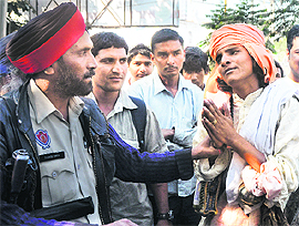 A godman begs for mercy in Ludhiana on Thursday