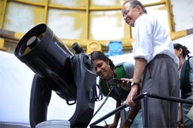 B.G. Sidharth, Director General of the BM Birla Science Centre, demonstrates to the audience the use of the Ultra modern C11 telescope at the G.P. Birla Observatory and Astronomical Research Centre in Hyderabad on November 15, 2011