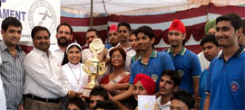Members of the Assumption Convent School football team after wining the Netaji Subhash Football Cup in Abohar on Friday.