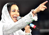 Punjabi singer Satwinder Bitti (left) performs during the Kabaddi World Cup semi-finals in Bathinda on Friday.