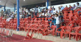 Empty chairs at the match venue.