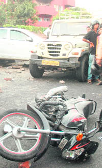 It was a narrow escape for a biker after his motorcycle, a pickup and a car (both visible in the backdrop) were involved in an accident near the fire station in Sector 32, Chandigarh
