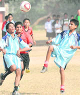 Players of St Joseph School and St Stephen's School vie for the ball during the Inter-School Football Tournament (U-14) at Sector 22, Chandigarh, on Friday. 