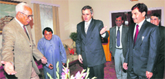 Jammu and Kashmir Governor NN Vohra with Nazir Ahmed (right) at the oath-taking ceremony in Jammu. 